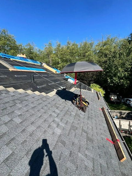 SunSafe Shield shade attachment on a Pitch Hopper on a steep-slope shingle roof