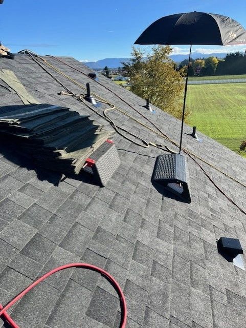SunSafe Shield umbrella attachment with Pitch Hopper on a shingle roof